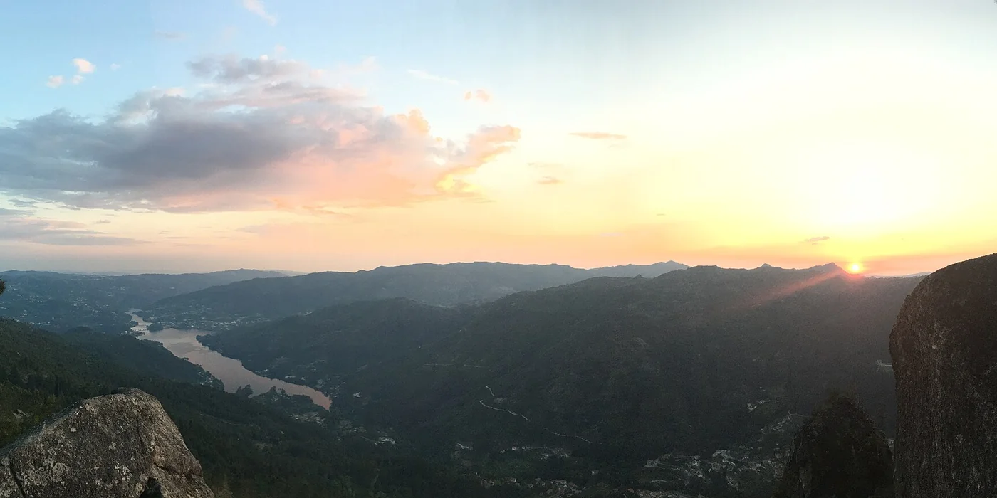 Sunset over the forested valleys of Peneda-Gerês seen from the Pedra Bela viewpoint